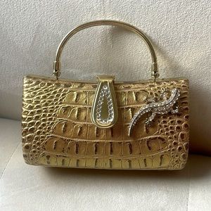 Iris Lane small gold clutch